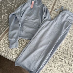 Blue sweatpants and quarter zip set! Never worn before and with tags!